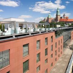 Отель Sheraton Grand Krakow Краков приотельная территория фото 2