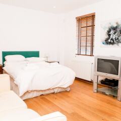 Отель Spectacular 4 Bed Flat Close to London Eye Великобритания, Лондон - отзывы, цены и фото номеров - забронировать отель Spectacular 4 Bed Flat Close to London Eye онлайн комната для гостей фото 2