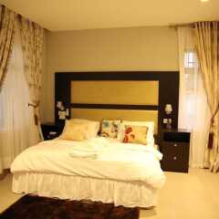 Отель Kiniz Luxury Apartments Нигерия, Уйо - отзывы, цены и фото номеров - забронировать отель Kiniz Luxury Apartments онлайн комната для гостей фото 4