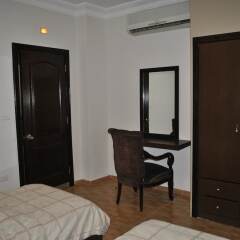 Alballouti Hotel Suites Амман удобства в номере фото 3