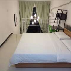 Апартаменты Kaimi Apartment Kesheng Plaza Branch комната для гостей фото 4