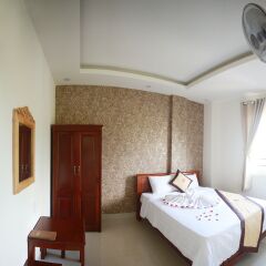 An An Hotel Da Lat Далат комната для гостей