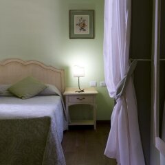 Отель Relais Corte Cavalli Понти-суль-Минчо сейф в номере