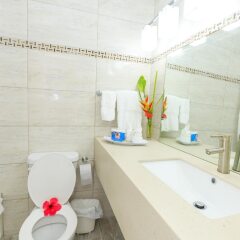 Отель Sunset Shores Beach Hotel Сент-Винсент и Гренадины, Остров Бекия - отзывы, цены и фото номеров - забронировать отель Sunset Shores Beach Hotel онлайн ванная