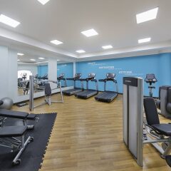 Отель Courtyard by Marriott Dubai Green Community фитнесс-зал фото 2