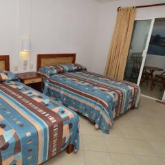 Hotel Suites Ixtapa Plaza комната для гостей