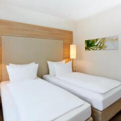 Отель H+ Hotel Salzburg Австрия, Зальцбург - 1 отзыв об отеле, цены и фото номеров - забронировать отель H+ Hotel Salzburg онлайн комната для гостей фото 3