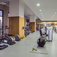 Отель Amwaj Rotana - Jumeirah Beach Residence фитнесс-зал фото 3