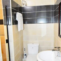 Отель Residency Hotel Enugu Нигерия, Энугу - отзывы, цены и фото номеров - забронировать отель Residency Hotel Enugu онлайн ванная