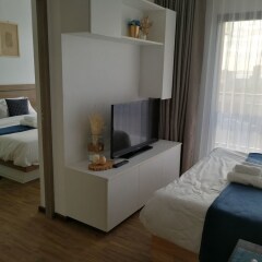 Отель Treetops Pattaya Condominium Паттайя комната для гостей