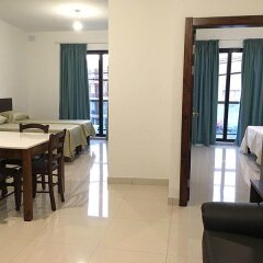 Апартаменты Shamrock Apartments Каура комната для гостей фото 5