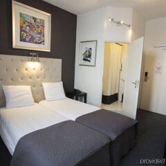 Отель Quentin Arrive Нидерланды, Амстердам - 7 отзывов об отеле, цены и фото номеров - забронировать отель Quentin Arrive онлайн комната для гостей фото 4