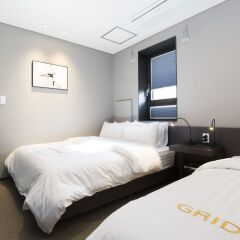 Отель Grid Inn комната для гостей фото 4
