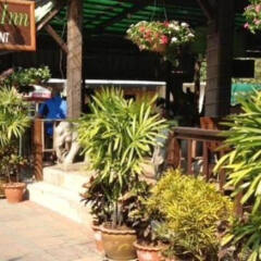 Отель Cucumber Inn Suites