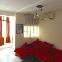 Отель Tirana Apartment Албания, Тирана - отзывы, цены и фото номеров - забронировать отель Tirana Apartment онлайн комната для гостей фото 2