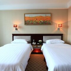 Отель Peony Wanpeng Hotel - Xiamen Китай, Сямынь - отзывы, цены и фото номеров - забронировать отель Peony Wanpeng Hotel - Xiamen онлайн комната для гостей фото 5