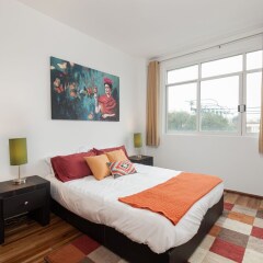 Апартаменты Luxury Balcony Apartments - FREE Parking & Netflix - Family Friendly Мехико комната для гостей фото 3