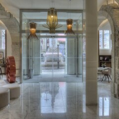 Отель NH Collection Porto Batalha интерьер отеля