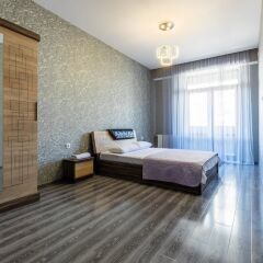 Апартаменты Apartment on Saakadze Square Тбилиси комната для гостей фото 2