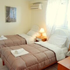 Отель Glyfada Gorgona Apartments Греция, Корфу - отзывы, цены и фото номеров - забронировать отель Glyfada Gorgona Apartments онлайн комната для гостей фото 2
