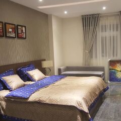 Апартаменты Sunny Serviced Apartment комната для гостей