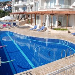 Cetinkaya Apartments Турция, Калкан - отзывы, цены и фото номеров - забронировать отель Cetinkaya Apartments онлайн бассейн фото 2