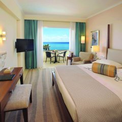 Отель Alexander The Great Beach Hotel Кипр, Пафос - 1 отзыв об отеле, цены и фото номеров - забронировать отель Alexander The Great Beach Hotel онлайн комната для гостей фото 3