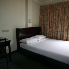 Отель Pinnacle Sukhumvit Inn Бангкок комната для гостей