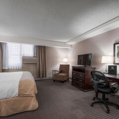 Отель Regency Suites Hotel Канада, Калгари - отзывы, цены и фото номеров - забронировать отель Regency Suites Hotel онлайн удобства в номере