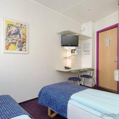 Отель Cabinn Aarhus Hotel Дания, Орхус - 2 отзыва об отеле, цены и фото номеров - забронировать отель Cabinn Aarhus Hotel онлайн комната для гостей фото 3