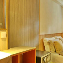 Отель Compass River City Boatel сейф в номере