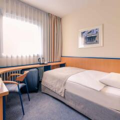Отель Mercure Düsseldorf City Center комната для гостей фото 5