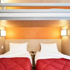 Отель Premiere Classe Paris Ouest - Pont de Suresnes комната для гостей фото 5