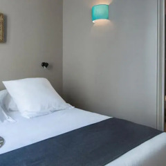 Отель Helzear Champs Elysées Suites сейф в номере