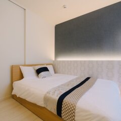 Отель GRAND BASE Hakata Haruyoshi Япония, Фукуока - отзывы, цены и фото номеров - забронировать отель GRAND BASE Hakata Haruyoshi онлайн комната для гостей фото 4