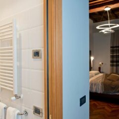 Отель Relais Forus Inn сейф в номере