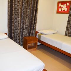 Апартаменты Al Minhaj Service Apartments Вити-Леву комната для гостей фото 2