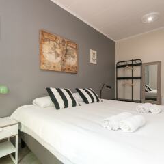 Отель Lovely and Central 4 BR Apartment Испания, Барселона - отзывы, цены и фото номеров - забронировать отель Lovely and Central 4 BR Apartment онлайн комната для гостей фото 3