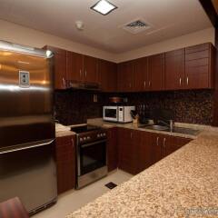 Xclusive Maples Hotel Apartment в номере