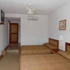 Hotel Suites Ixtapa Plaza комната для гостей фото 3