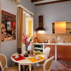 Апартаменты Casa De Fiori Apartments в номере