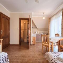 Апартаменты Visitzakopane City Apartments Закопане комната для гостей фото 4