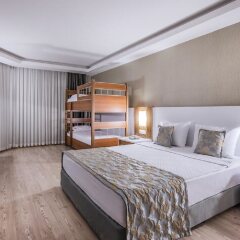 Отель Palm Wings Ephesus Beach Resort Торбали комната для гостей фото 5
