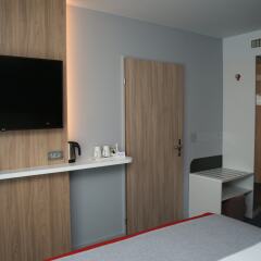 Отель Holiday Inn Express Zurich Airport Швейцария, Рюмланг - 1 отзыв об отеле, цены и фото номеров - забронировать отель Holiday Inn Express Zurich Airport онлайн удобства в номере фото 2