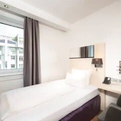 Отель Scandic Berlin Kurfürstendamm Германия, Берлин - 4 отзыва об отеле, цены и фото номеров - забронировать отель Scandic Berlin Kurfürstendamm онлайн комната для гостей фото 3