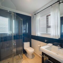Отель Candlewood Lodge ванная
