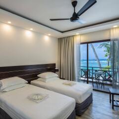 Гостевой Дом Canopus Retreat Thulusdhoo Остров Гасфинолу комната для гостей фото 2