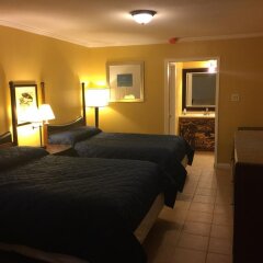 Отель Dragon Inn & Suites комната для гостей фото 2