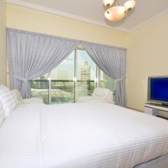 Отель Dubai Stay - Burj Al Nujoom Downtown Holiday Apartment ОАЭ, Дубай - отзывы, цены и фото номеров - забронировать отель Dubai Stay - Burj Al Nujoom Downtown Holiday Apartment онлайн комната для гостей фото 2