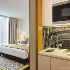 Отель La Clef Tour Eiffel (ex. Citadines Suites Arc de Triomphe) в номере